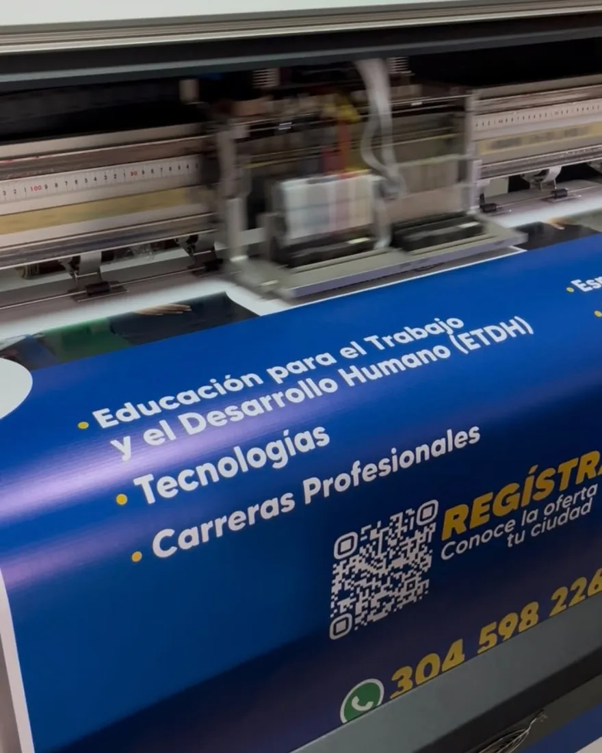 Vinyl banner coming out of a large-format printer